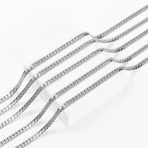 Classic silver Cuban link stainless steel necklaces for men in a group showcase display