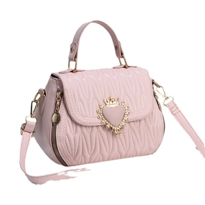 Pink pleated bucket bag with gold crown heart buckle and top handle for women