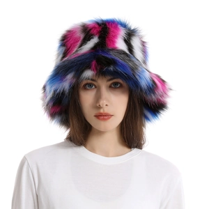 Detailed close-up of pink, blue, black, and white faux fur patchwork bucket hat