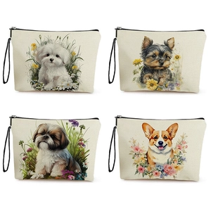 Detail showing four dog illustration patterns on canvas makeup bags with zippers