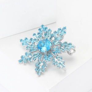 Exquisite silver snowflake brooch with light blue cubic zirconia for women's fashion