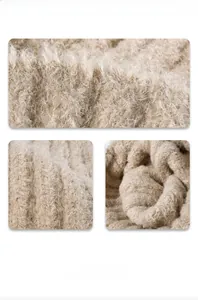 Macro detail of the thick camel ribbed knit fabric showing soft plush mohair texture