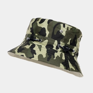 Detail view of camouflage sun hat featuring metal eyelets and adjustable Sport cord
