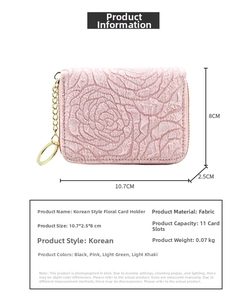 Detail of pink floral embossed card holder showing 10.7x2.5x8cm size and 11 card slots