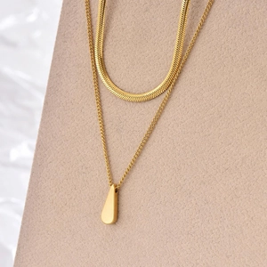 Double-layered gold titanium steel necklace with a sleek herringbone chain and teardrop pendant