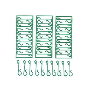 Green plastic S-shaped Christmas ornament hooks for hanging festive holiday decorations