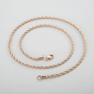 Detail of rose gold twisted rope chain necklace with a secure lobster clasp