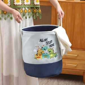 Large blue canvas storage basket with dinosaur embroidery and thick cotton rope handles