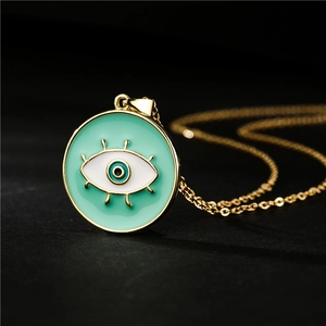 Collana dorata con ciondolo malocchio in smalto turchese su catena a maglie d'oro