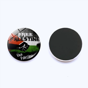 Macro detail of Palestine flag fridge magnet with crystal glass dome and soft magnetic back