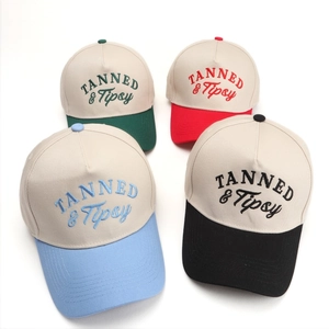 Patchwork baseball caps with TANNED & Tipsy embroidery in various color combinations