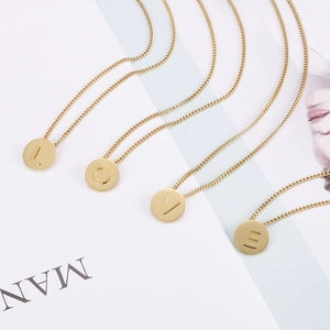 Gold stainless steel chain necklaces featuring round pendants with L O V E initials