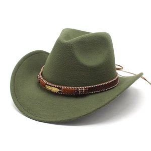 Detail of army green western cowboy hat with ethnic band and gold metal feather accent