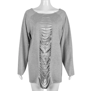 Close-up of grey long-sleeved sweatshirt featuring unique cutout and distressed details