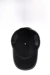 Detail of warm winter baseball cap for men featuring fold-down ear flaps and quilted lining