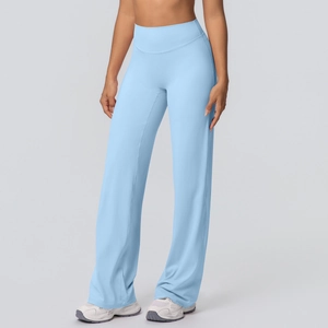 Close-up of light blue high-waisted wide-leg yoga pants with smooth elastic fabric texture
