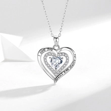 Macro shot of S925 sterling silver double heart necklace with I love you forever engraving