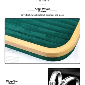 Detail view of premium wooden jewelry tray with green microfiber lining and curved edges