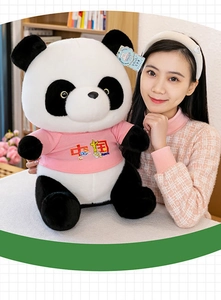 Close-up of cute panda plush toy wearing a pink China T-shirt with model