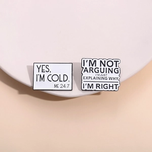 Cartoon geometric quote enamel pins featuring fun English lettering on a pink tray