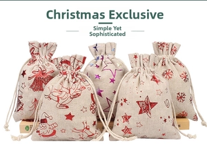 Detailed view of 5-pack linen Christmas drawstring gift bags with sequined Santa motifs