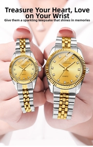 Detailed view of luxury gold and silver couple quartz watches with diamond markers