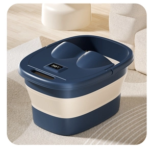 Detail view of foldable foot bath bucket with digital temperature display and massager lid