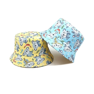 Kids koala print bucket hats in yellow and light blue colors with cartoon patterns