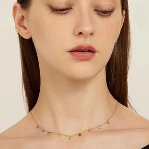 Chic 18K gold plated chain necklace with colorful gemstones worn by model