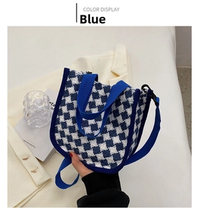 Detailed close-up of a blue and white checkered mini tote bag with adjustable shoulder strap