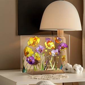 Floral acrylic plaque with wood base on a cozy bedside table in soft light decor