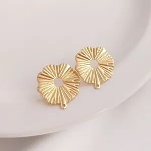 Detailed view of 14K gold filled leaf-shaped earring charms for DIY jewelry making