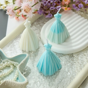 Elegant white and blue wedding dress scented candles with realistic fabric textures
