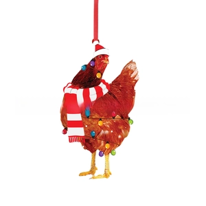 Detailed view of rooster Christmas ornament with red scarf and hat on white background