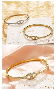Detailed close-up of gold and silver evil eye bracelets with sparkling pavé crystals
