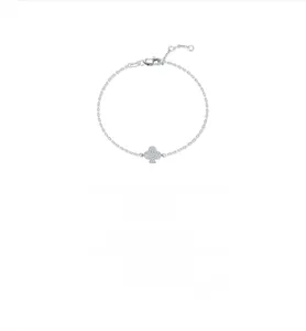 Macro detail of S925 sterling silver poker club charm bracelet with moissanite pave setting