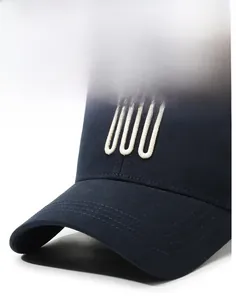 Close-up detail showing the sturdy brim and white embroidery on a navy blue baseball cap