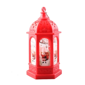 Red Christmas lantern featuring Santa Claus patterns on a clean white background