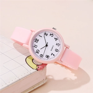 Reloj de cuarzo rosa minimalista con correa de silicona y esfera numérica escolar