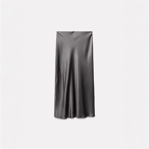 Elegant charcoal grey satin midi skirt featuring a high-waisted fit and silky finish