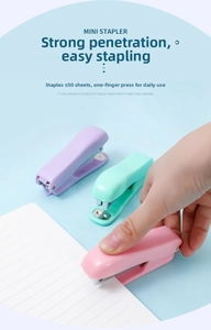 Mini macaron stapler set in pink and mint green with 50-sheet capacity detail