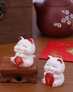 Cute mini lucky cat figurines on a wooden base with Peace and Joy blessing tags