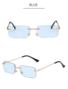 Detail of rimless blue square sunglasses with gold metal frame and spring hinges