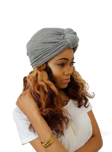 Detail of grey twist knot turban headwrap showing soft knitted fabric texture and elasticity