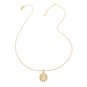 Golden bead chain necklace with religious icon pendant and pearl halo on white background