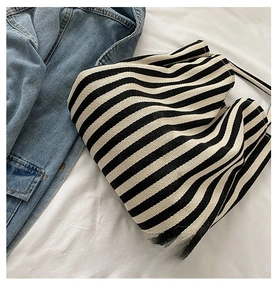 Detail of black and white striped canvas tote bag with textured heavy twill fabric finish