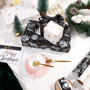Christmas kraft paper gift wrap with floral and star patterns in holiday setting