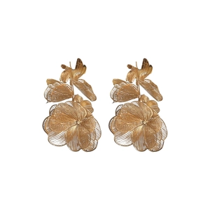 Exaggerated gold hollow metal flower tassel drop earrings with intricate wire petals