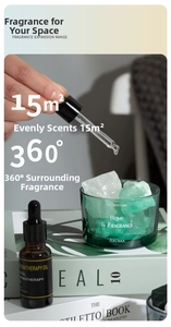 Detailed view of green crystal stones in a glass jar with essential oil dropper