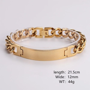 Detail view of 21.5cm gold Cuban chain bracelet with 12mm wide polished curved bar